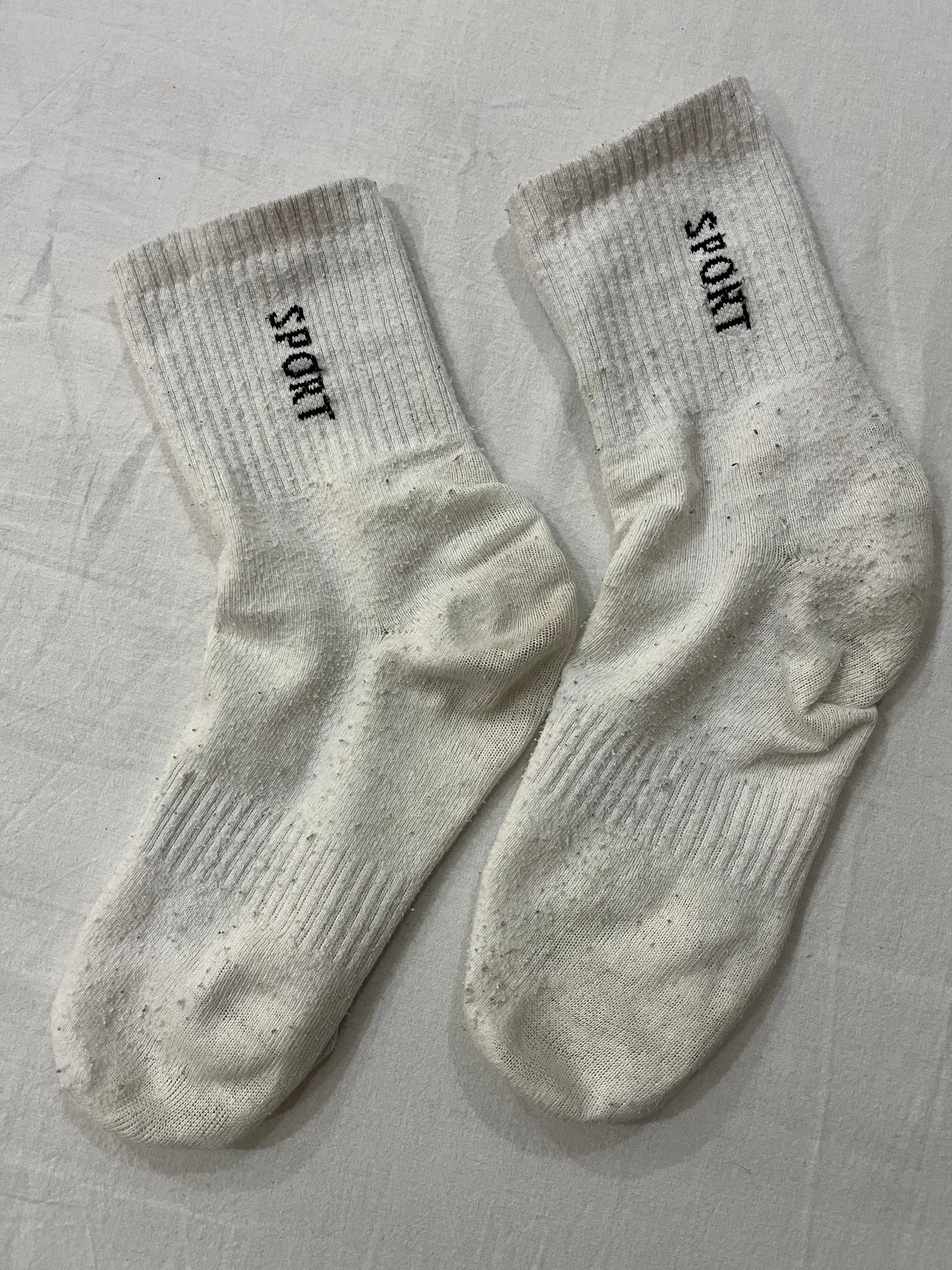 Extra-old white crew socks with 'Sport' inscription