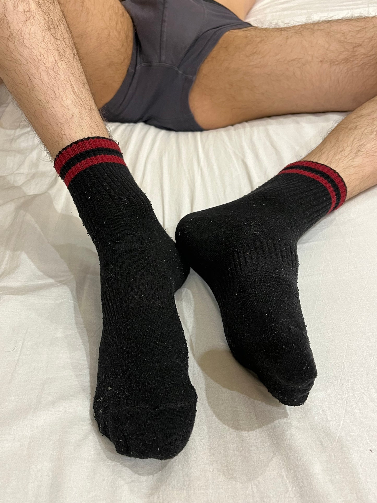 Black crew socks with red stripes