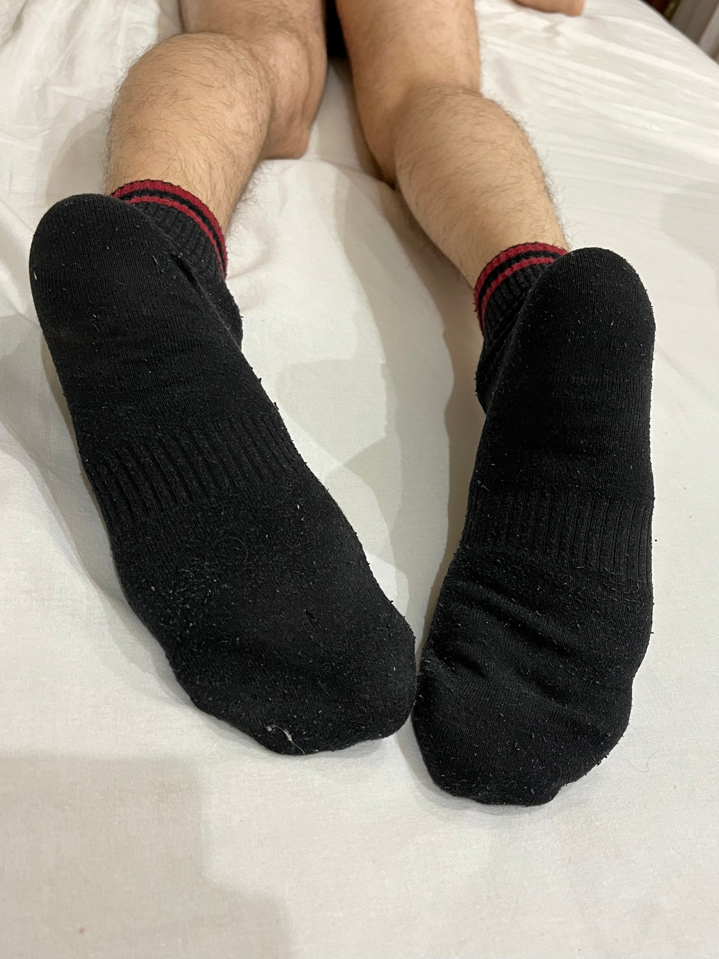 Black crew socks with red stripes